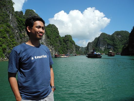 A Traveler in Ha Long Bay, Vietnam A Traveler in Ha Long Bay, Vietnam