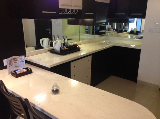 The small kitchenette is perfect for those who like to eat inside their room